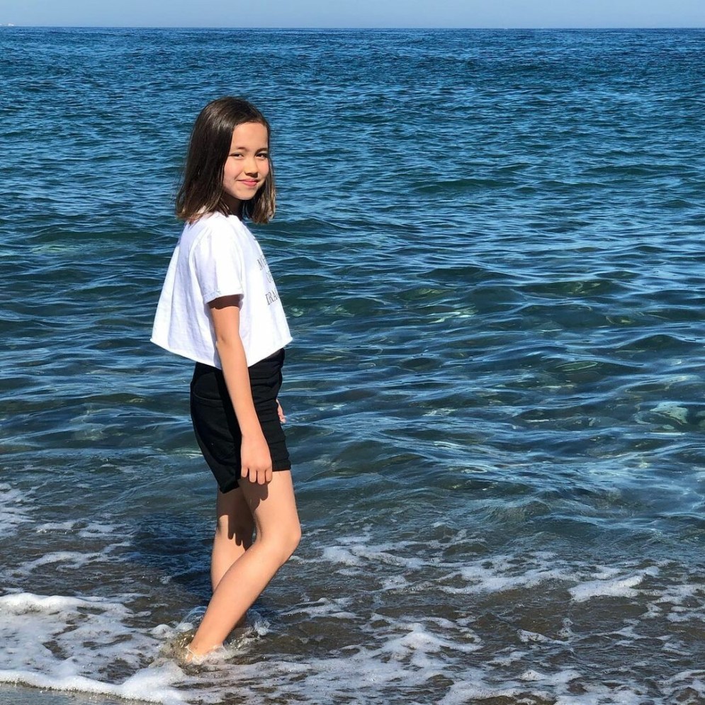 In a bikini girl behind the sea